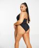 ASOS Curve ASOS DESIGN Curve adjustable leg halter swimsuit in black - 4