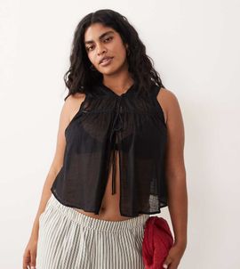 ASOS Curve ASOS DESIGN Curve Calypso tie front beach vest with lace cut out trim in black