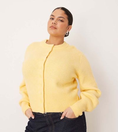 ASOS Curve ASOS DESIGN Curve compact fluffy cardigan with structured sleeve in buttermilk-Yellow