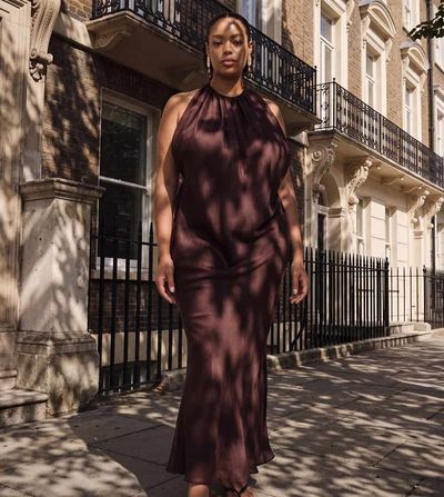 ASOS Curve ASOS DESIGN Curve draped halter neck maxi dress with knot back detail in chocolate brown