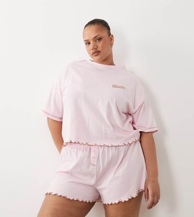 ASOS Curve ASOS DESIGN Curve embroidered siesta slogan short sleeve tee and shorts pajama set with lettuce edge in pink