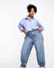 ASOS Curve ASOS DESIGN Curve high rise relaxed mom jeans in mid blue - 1