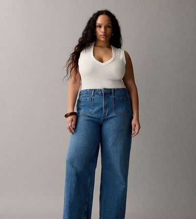 ASOS Curve ASOS DESIGN Curve high rise wide leg jeans with front pockets in mid blue