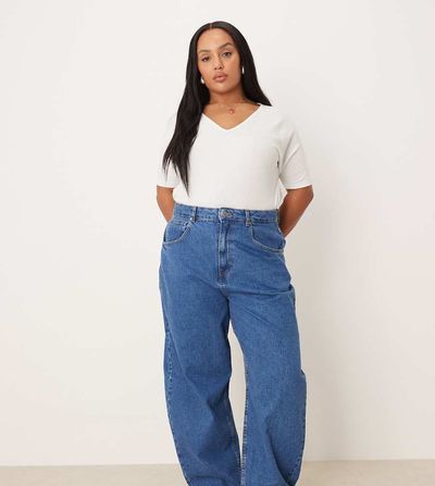 ASOS Curve ASOS DESIGN Curve high waisted barrel leg jeans in mid blue