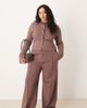 ASOS Curve ASOS DESIGN Curve interlock cuffed hem sweatpants in brown - 1