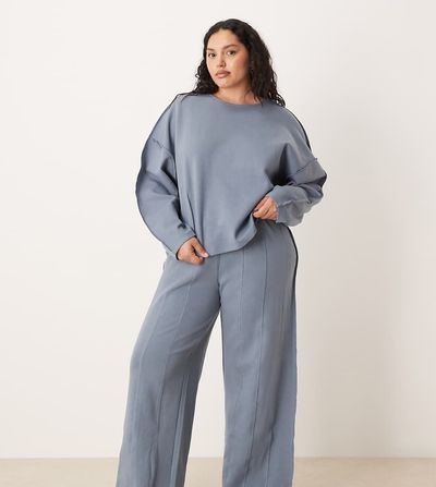 ASOS Curve ASOS DESIGN Curve interlock super wide leg sweatpants with seam detail in blue