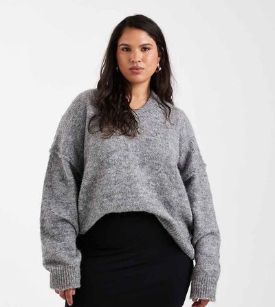 ASOS Curve ASOS DESIGN Curve jersey mini skirt in black
