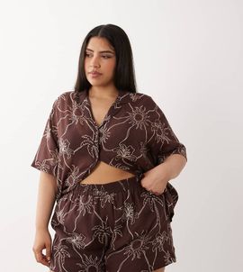 ASOS Curve ASOS DESIGN Curve Logan beach resort shorts in tropical stencil print-Multi