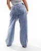 ASOS Curve ASOS DESIGN Curve low rise baggy jeans in mid blue - 4