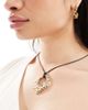 ASOS Curve ASOS DESIGN Curve necklace with cord and hammered pendant design in gold tone - 1