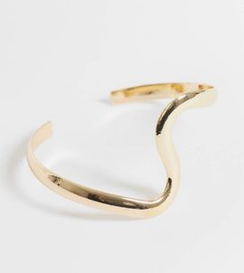 ASOS Curve ASOS DESIGN Curve open cuff bracelet with wave design in gold tone
