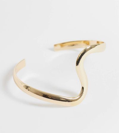 ASOS Curve ASOS DESIGN Curve open cuff bracelet with wave design in gold tone