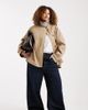 ASOS Curve ASOS DESIGN Curve oversized cape detail with plaid liner in rye-Neutral - 1