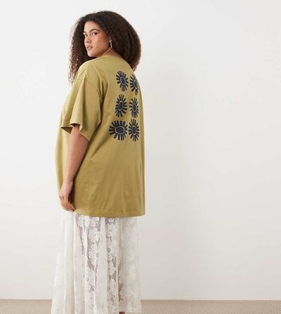 ASOS Curve ASOS DESIGN Curve oversized graphic tee with lace cami underdress in green