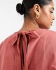 ASOS Curve ASOS DESIGN Curve oversized short sleeve peplum top in blush-pink - 4