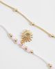 ASOS Curve ASOS DESIGN Curve pack of 2 beaded anklets with sun charms in pink and gold tone - 3