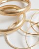 ASOS Curve ASOS DESIGN Curve pack of 4 mixed bangles in gold tone and brushed gold tone - 2