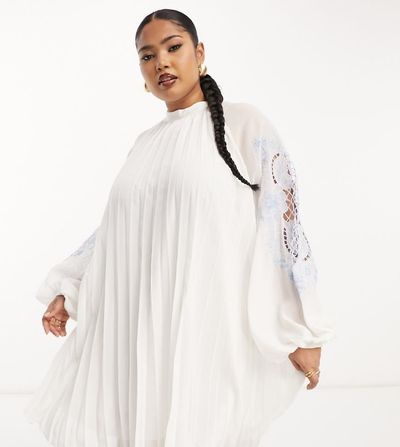 ASOS Curve ASOS DESIGN Curve pleated babydoll mini dress with oversized cutwork sleeve in white