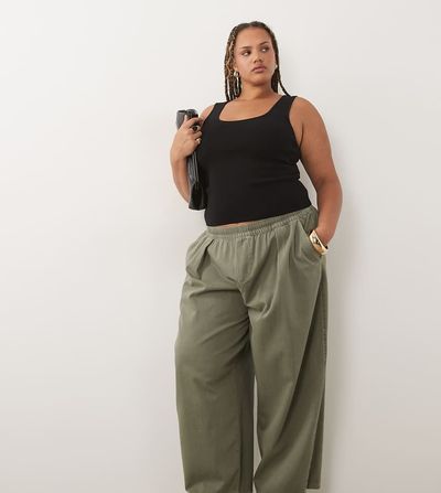 ASOS Curve ASOS DESIGN Curve pull on barrel leg pants in washed khaki green