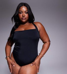 ASOS Curve ASOS DESIGN Curve Revenge halter tie neck swimsuit in black