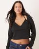ASOS Curve ASOS DESIGN Curve ribbed halter neck long sleeve top in black - 1