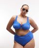 ASOS Curve ASOS DESIGN Curve Rory spliced rib high waist wrap front bikini bottom in blue - 1