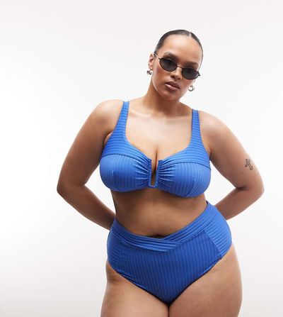 ASOS Curve ASOS DESIGN Curve Rory spliced rib high waist wrap front bikini bottom in blue