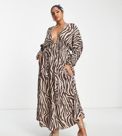 ASOS Curve ASOS DESIGN Curve ruched long sleeve plunge beach maxi dress in animal print-Multi