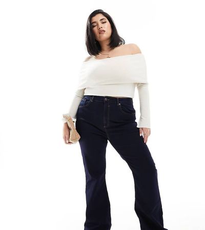 ASOS Curve ASOS DESIGN Curve sculpting super stretch flare jeans in dark blue