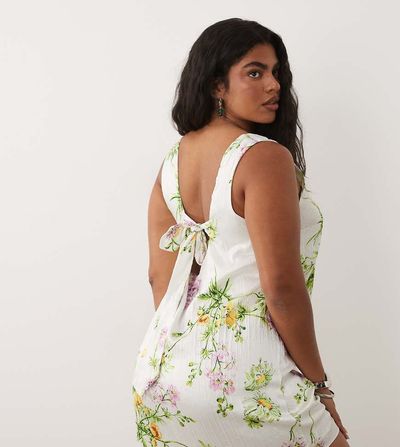 ASOS Curve ASOS DESIGN Curve shift mini dress with bow back detail in multi floral print