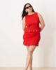 ASOS Curve ASOS DESIGN Curve shirred peplum mini skirt in red - part of a set - 1