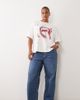 ASOS Curve ASOS DESIGN Curve short sleeve oversized teeth graphic top in cream-WHITE - 1