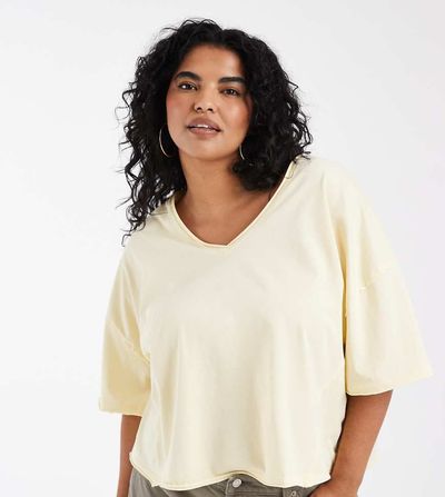 ASOS Curve ASOS DESIGN Curve slouchy V-neck T-shirt in washed buttermilk-Yellow