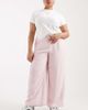 ASOS Curve ASOS DESIGN Curve soft textured wide leg pants in pink - 1