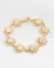 ASOS Curve ASOS DESIGN Curve t-bar bracelet with small sun design in gold tone - 1