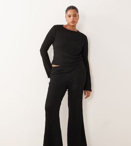 ASOS Curve ASOS DESIGN Curve textured high waist flared leg pants in black - part of a set