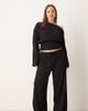 ASOS Curve ASOS DESIGN Curve textured tie waist wide leg pants in black - part of a set - 1