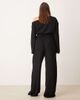 ASOS Curve ASOS DESIGN Curve textured tie waist wide leg pants in black - part of a set - 4