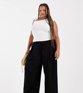 ASOS Curve ASOS DESIGN Curve textured wide leg pants with tie waist in black