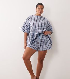 ASOS Curve ASOS DESIGN Curve tie waist pocket detail shorts in blue plaid-Multi