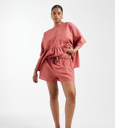 ASOS Curve ASOS DESIGN Curve tie waist pocket detailing shorts in blush-pink