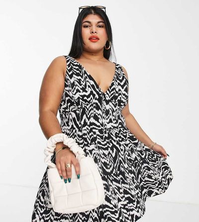 ASOS Curve ASOS DESIGN Curve tiered sundress with button waist detail in black and cream abstract print-Multi