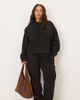 ASOS Curve ASOS DESIGN Curve ultimate cuffed brushback sweatpants in black - 1