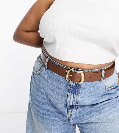 ASOS Curve ASOS DESIGN CURVE wavy buckle waist and hip jeans belt in tan-Brown