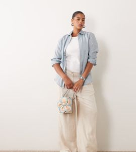 ASOS Curve ASOS DESIGN Curve wide leg pants with pleat detail in linen blend in natural-Neutral