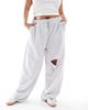 ASOS Curve ASOS DESIGN Curve wide leg sweatpants with ripped knee in gray heather - 4