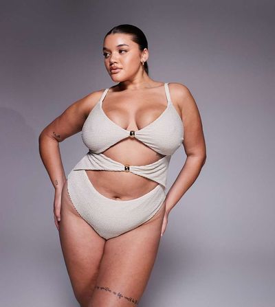 ASOS Curve ASOS DESIGN Curve Winter crinkle cut out swimsuit with hardware in metallic cream-Neutral
