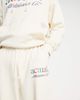 ASOS DESIGN ASOS Actual relaxed brushed cotton sweatpants with multi color logo print in cream - part of a set-White - 4