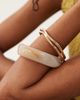 ASOS DESIGN ASOS DESIGN 3 pack of bangles in natural resin and gold tone - 4
