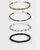 ASOS DESIGN ASOS DESIGN 4 pack black faux leather and beaded bracelet in brown - 1